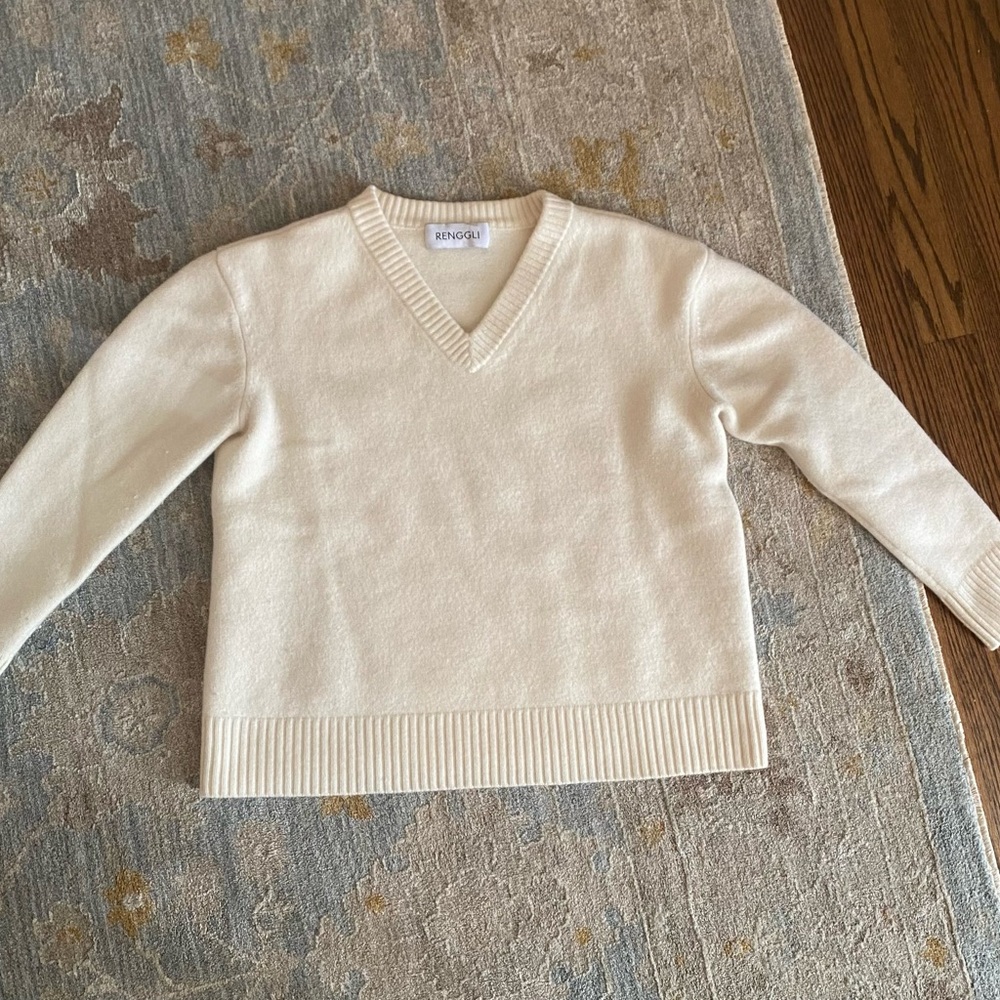 Morgan Stewart’s Renggli V neck sweater for sale